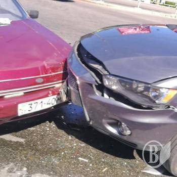 Зіткнулися Mitsubishi Lancer та інвалідна «Таврія» Зіткнулися Mitsubishi Lancer та інвалідна «Таврія»