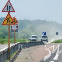 ШБУ-14 вкладає щебінь з мастикою на шляху на Ріпки ШБУ-14 вкладає щебінь з мастикою на шляху на Ріпки